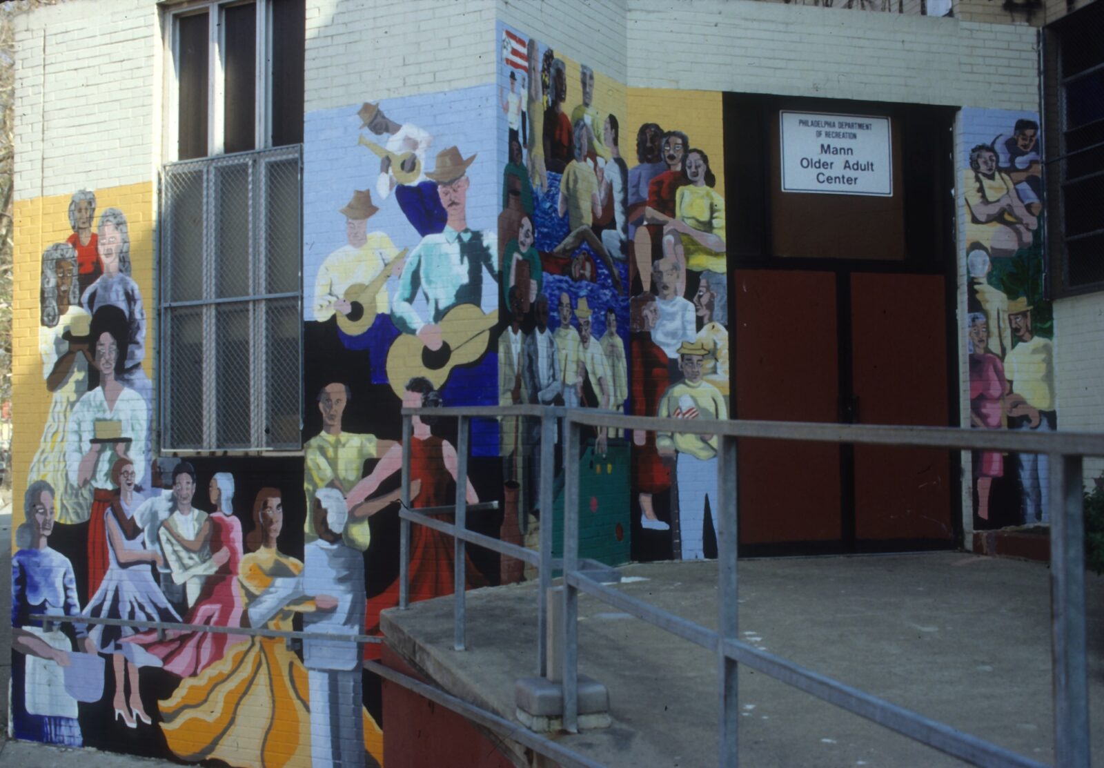 Four music-themed murals at the Mann Older Adult Center (titles